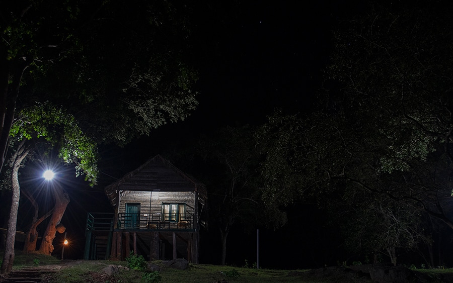 Our log hut, Chamundi at night.